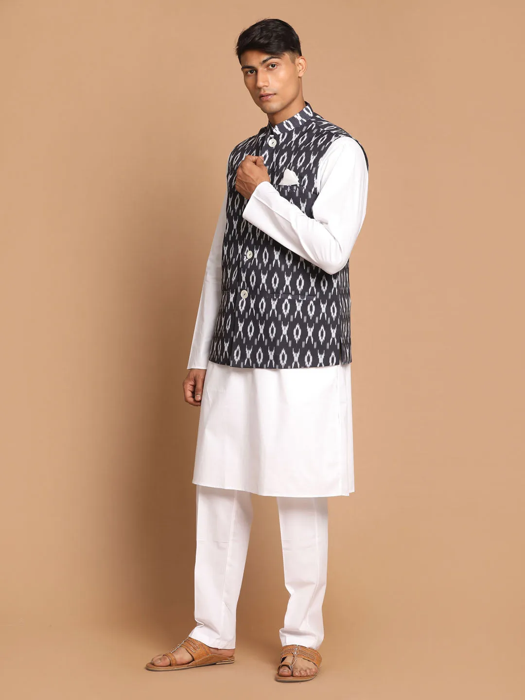 VASTRAMAY Men's Black Ikkat Printed Cotton Nehru Jacket With White Kurta And Pyjama Set